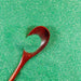 Soft Shamrock green iridescent craft glitter with a wooden spoon.