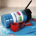 Blue Sour Blue Raspberry candy toppers shaker bottle, 3oz, with powder spilled and red candy strips.