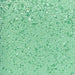 Close-up swatch of Sweet & Sour Candy Toppers | Larger sugar particles in green | Tangy green apple blend revealed