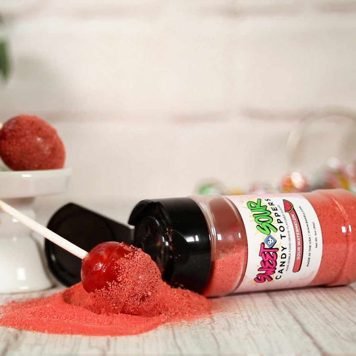 red lollipop covered watermelon sour candy