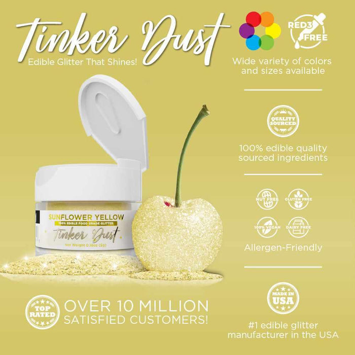 Sunflower Yellow Tinker Dust edible glitter jar, open, next to a glitter-coated cherry on a pile of glitter.