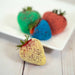Juicy strawberries adorned with yellow Sweet & Sour Candy Toppers | Tangy twist of banana flavor | Berrylicious decorations