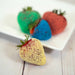 Juicy strawberries adorned with yellow Sweet & Sour Candy Toppers | Tangy twist of banana flavor | Berrylicious decorations