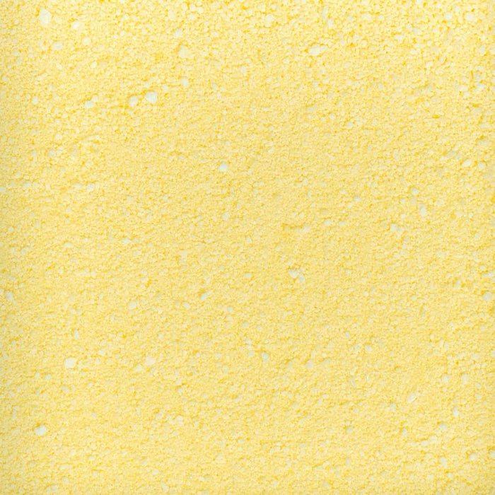 Close-up swatch of Sweet & Sour Candy Toppers | Larger sugar particles in yellow | Tangy banana blend revealed