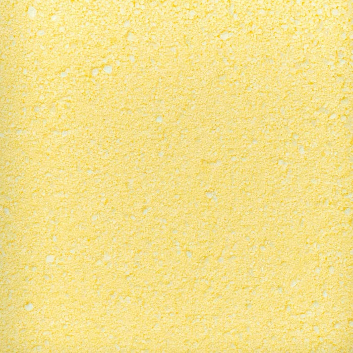 Close-up swatch of Sweet & Sour Candy Toppers | Larger sugar particles in yellow | Tangy banana blend revealed