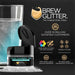 Teal Color Changing Brew Glitter in a small black jar next to a glass of water, with product features.