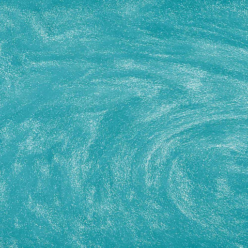 Teal edible drink glitter swirling in a beverage to create a shimmering, sparkling effect.