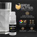 White Brew Glitter edible mini spray pump next to a glass of water.