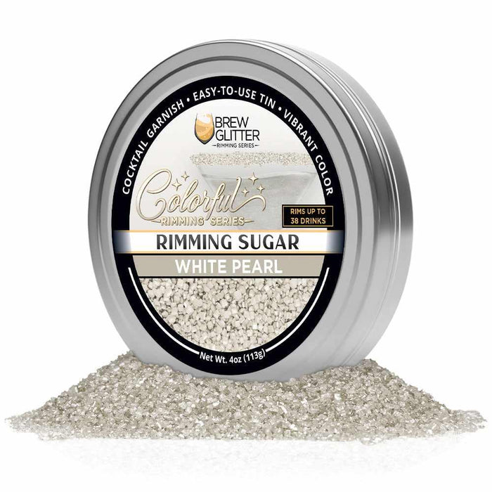 Round silver tin of White Pearl cocktail rimming sugar with a black label, surrounded by a pile of sparkling white sugar crystals.