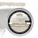 4oz tin of White Pearl cocktail rimming sugar with sparkling white crystals displayed on a martini glass rim.