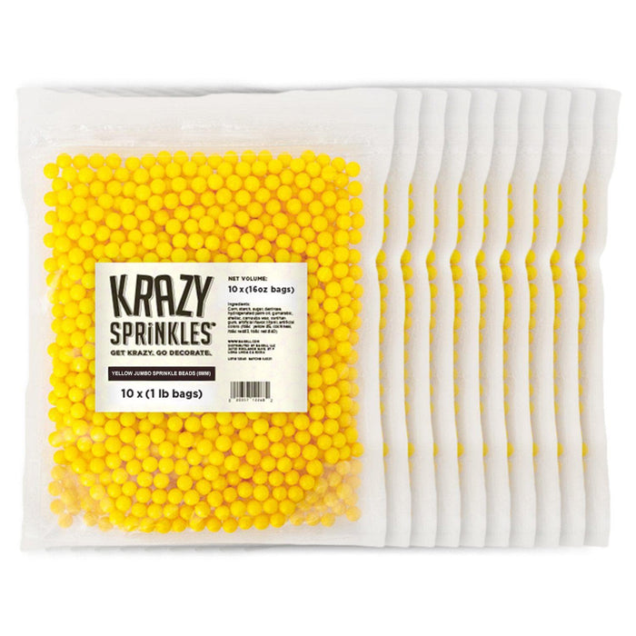Yellow 8mm edible sprinkle beads in clear 1lb bags, stacked for bulk sale.