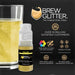 Yellow Brew Glitter edible mini spray pump next to a glass of glittery yellow beverage.