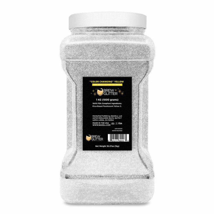 1kg bulk container of white color-changing Brew Glitter, transforming to yellow.