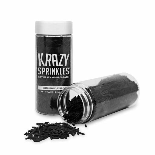Two clear jars of Krazy Sprinkles black jimmies, one upright and one spilling sprinkles.