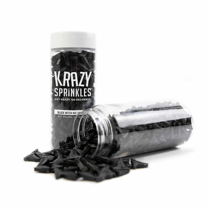 Krazy Sprinkles black witch hat shaped sprinkles in two clear containers, one upright, one spilling.