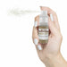 Spray glitter edible dust being sprayed by female. | bakell.com