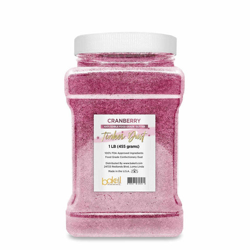 1lb bulk container of Cranberry Tinker Dust edible glitter, a vibrant pink food-grade confectionery dust.