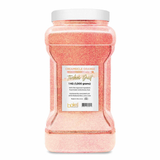1kg bulk Creamsicle Orange Tinker Dust edible glitter in a clear jar with a white lid.