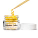 Yellow edible shimmer flakes in a 4g jar with a wooden tool sprinkling flakes.