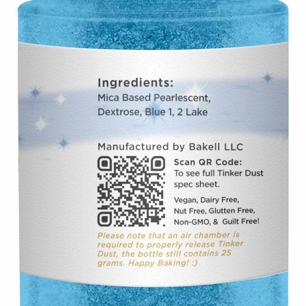 Close-up of a blue edible glitter spray bottle, showing ingredients, QR code, and product details.