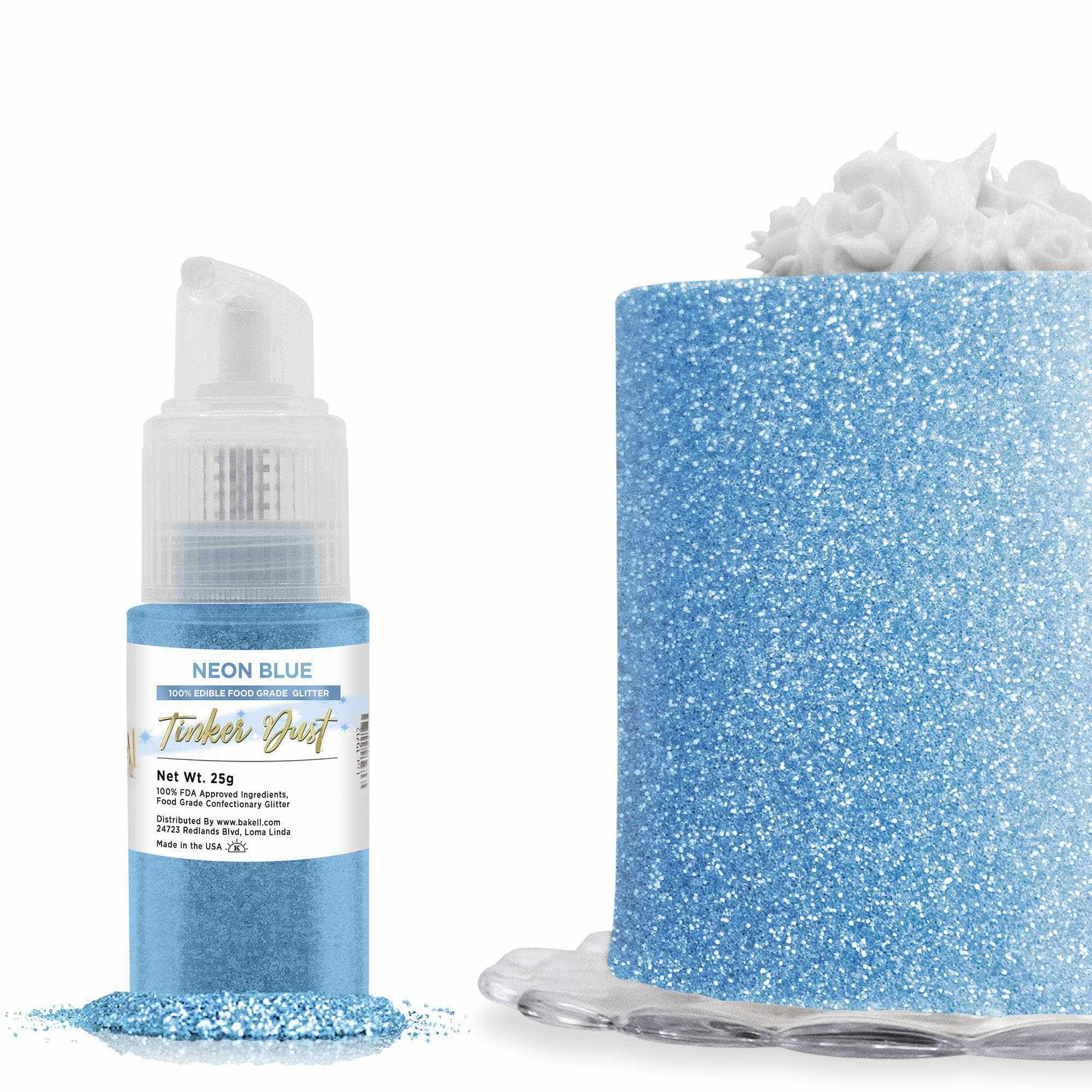 Neon Blue Tinker Dust edible glitter spray pump next to a cake covered in shimmering blue glitter.