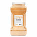 Large clear jar of Neon Orange Tinker Dust edible glitter, 1kg size, with white lid and label.