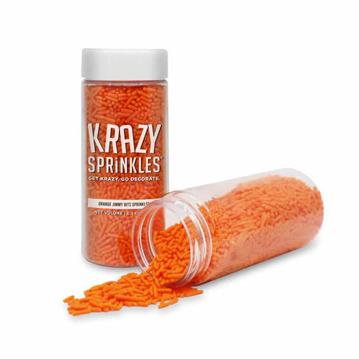 Krazy Sprinkles orange jimmies in a clear plastic jar, with another jar spilling sprinkles.
