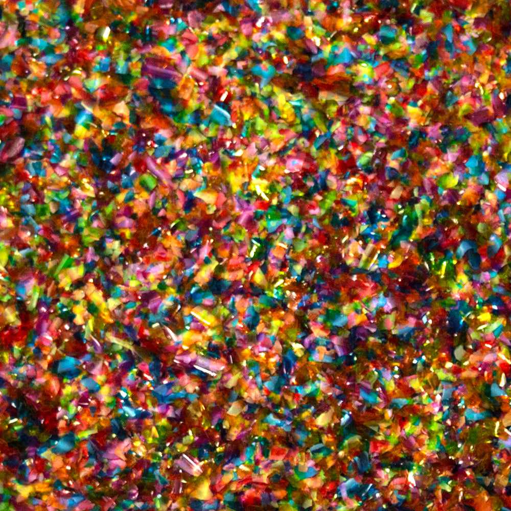 Close up of Rainbow Edible Shimmer Flakes | bakell.com