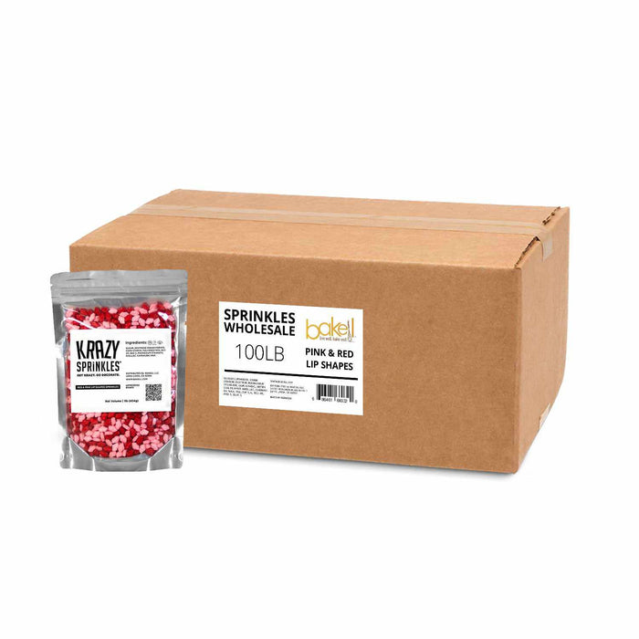 Front view of a 1 pound bag of Red and Pink Lips Sprinkles, with a 100 pound box of sprinkles in the back. | bakell.com