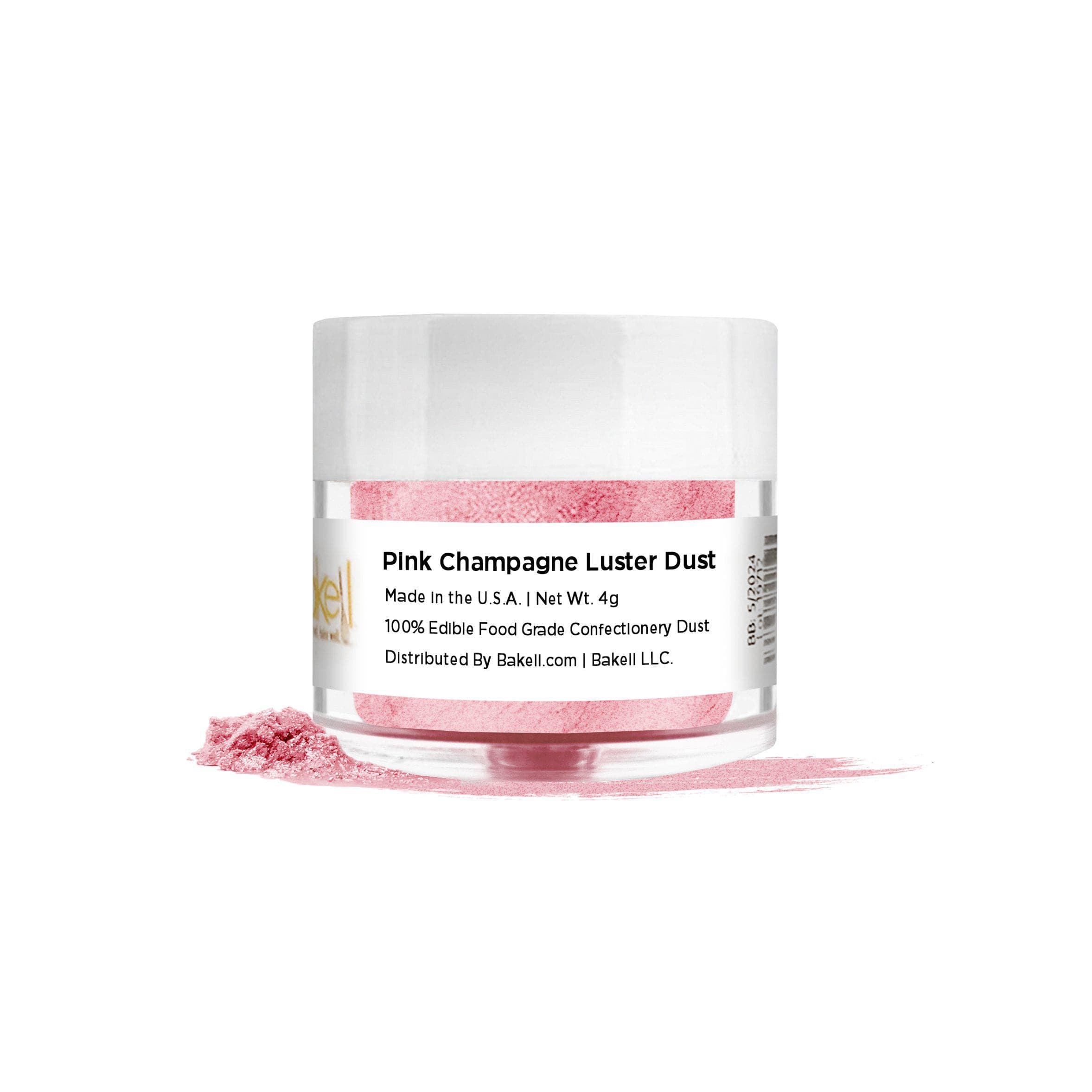 Pink Champagne Luster Dust in a clear jar with a white lid, a small pile of pink powder next to it.