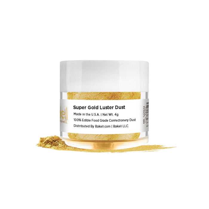 Super Gold Luster Dust in a clear jar with white lid, spilled on a white surface.