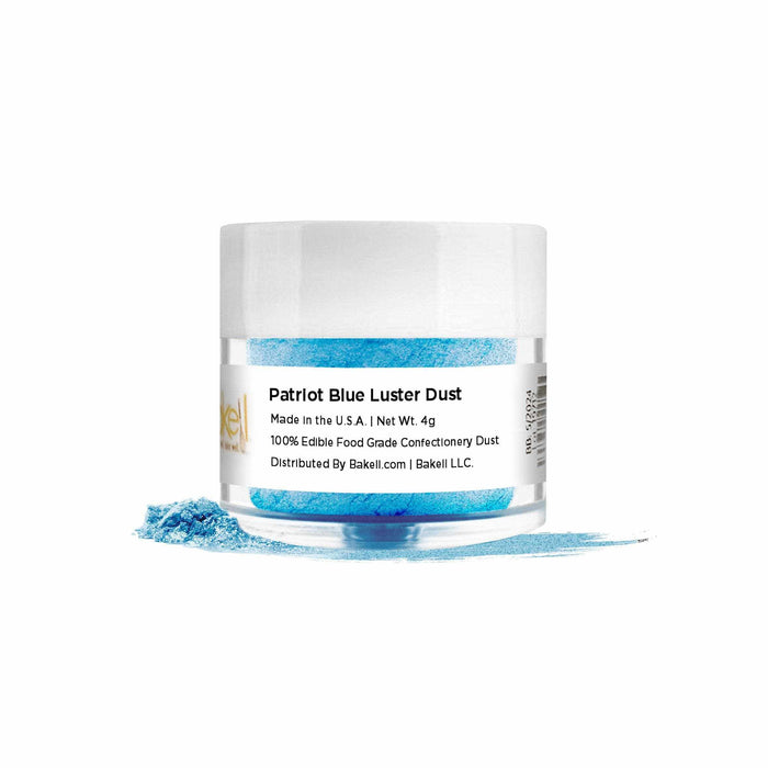 Patriot Blue Luster Dust in a clear jar with a white lid, spilling light blue powder.