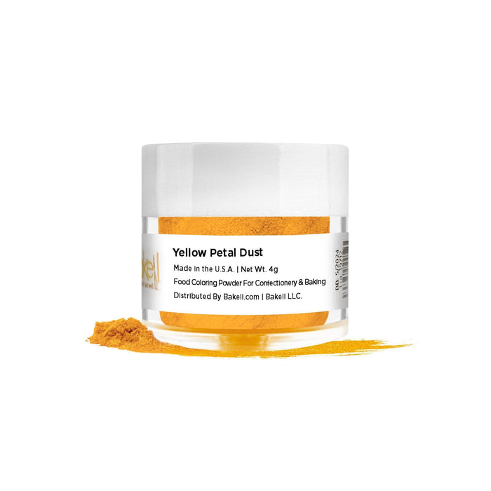 Yellow Petal Dust food coloring powder in a clear jar with a white lid, spilled on a white surface.