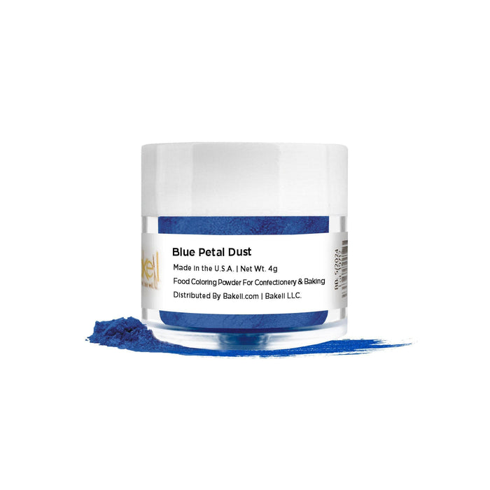 Blue Petal Dust in a clear jar with a white lid, spilling vibrant blue powder onto a white surface.