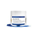 Blue Petal Dust in a clear jar with a white lid, spilling vibrant blue powder onto a white surface.