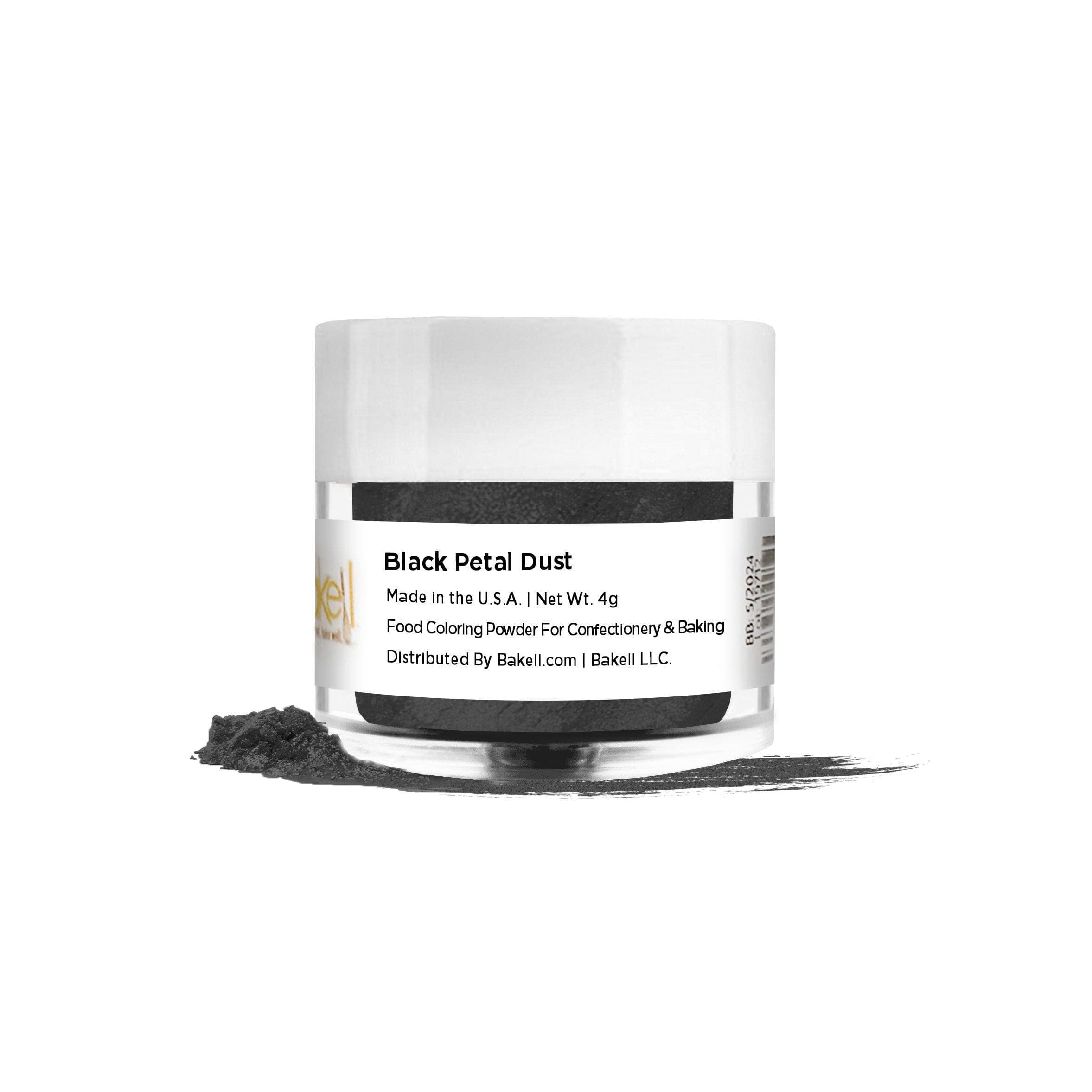 Black Petal Dust in a clear jar with a white lid, with a small pile of black powder next to it.