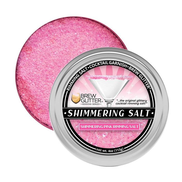 Shimmering pink cocktail rimming salt in a 4oz silver tin with a martini glass graphic.