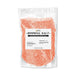 One pound bag of shimmering red cocktail rimming salt with a white product label and Brew Glitter branding.