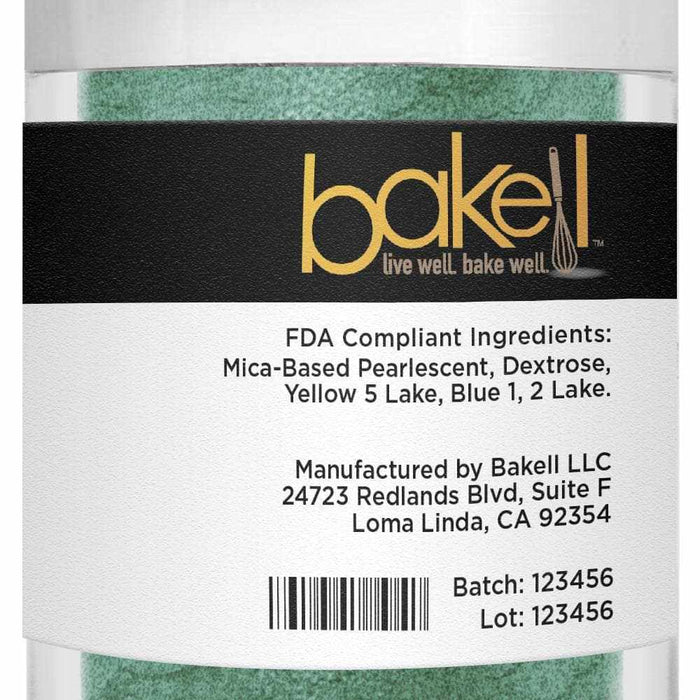 Spruce green luster dust in a clear jar with a black Bakell label and ingredient list.