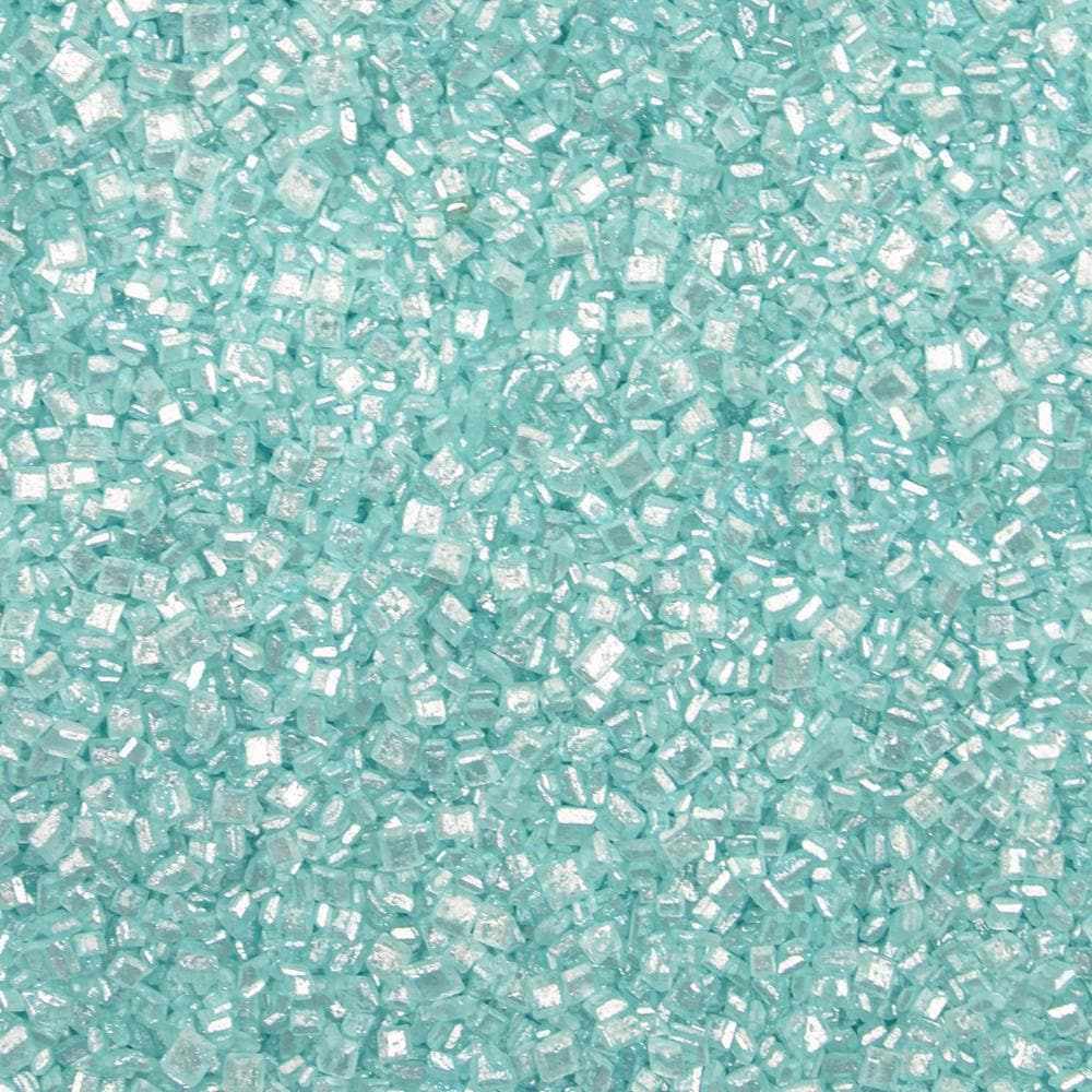 Close-up of light blue sugar rock sprinkles, sparkling and textured.